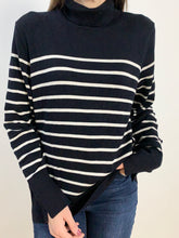 Pullover bianco e nero