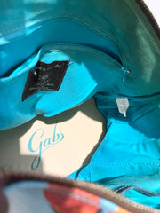 Gabs . Borsa trasformabile in vera pelle, stampa paesaggio autunnale
