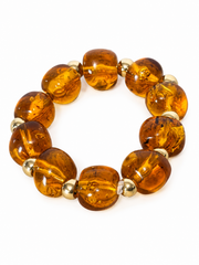 Bracciale vintage · Perle scultoree effetto ambra