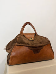 Borsa vintage in pelle e suede, fascino rétro dal carattere deciso